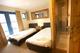 One of the en-suite Twin Bedroom