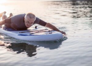 Paddleboarding lying down